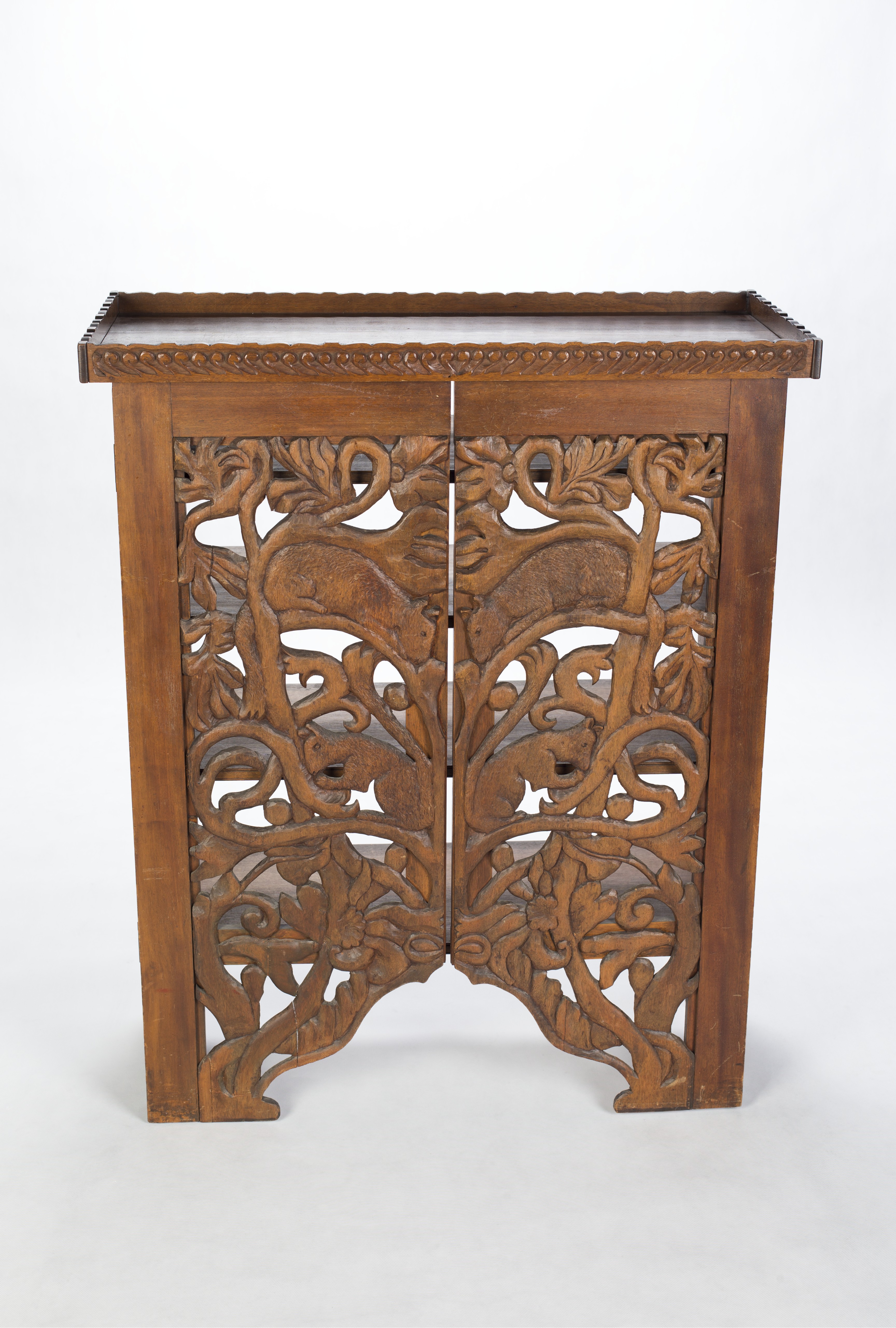 A carved timber bookcase, circa 1900, belonging to Dorothea Mackellar