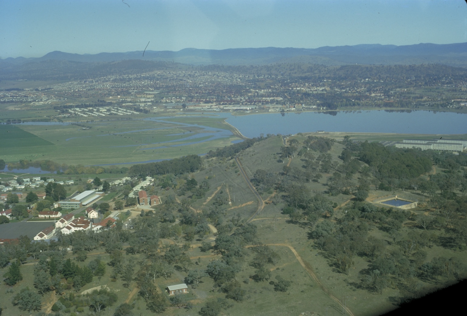 Aerial photo showing a Lake Burley Griffin in progress of being filled