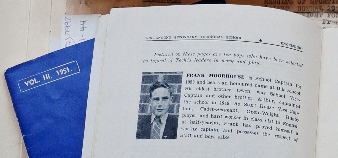 A page open with a picture of a schoolboy with some text about him next to it