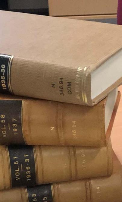 Law books stacked on a desk