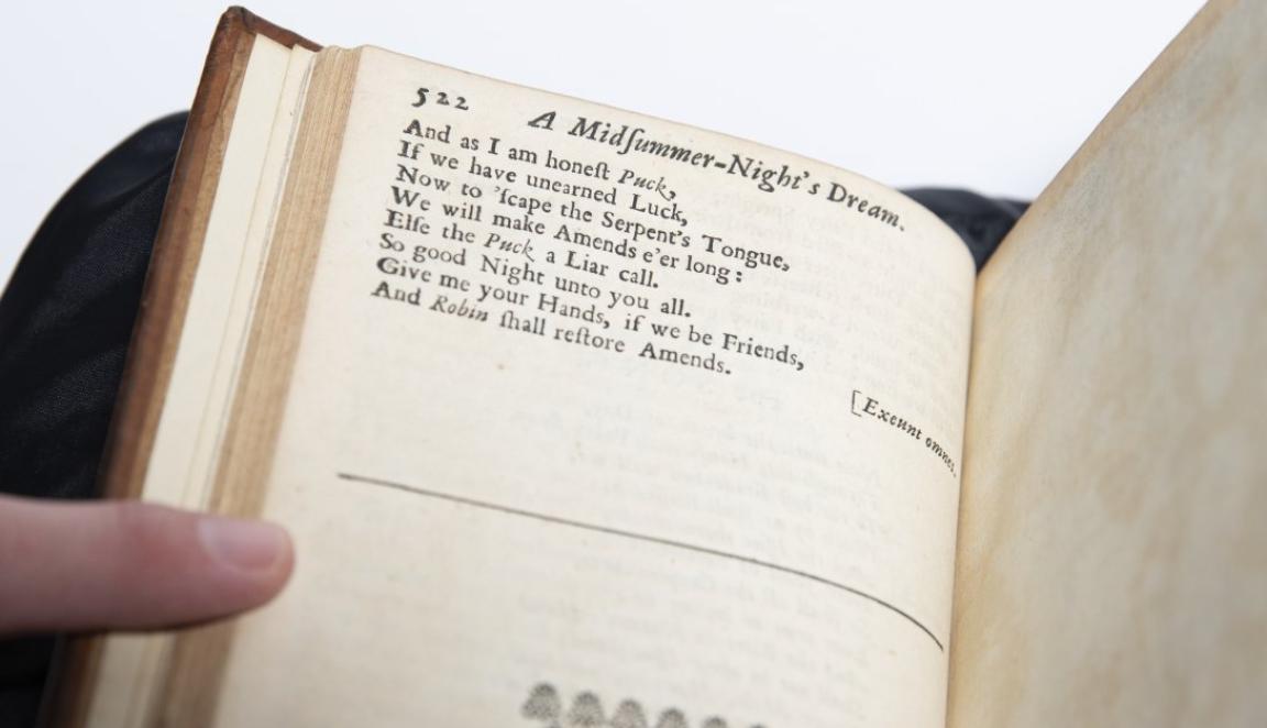 Close up of lines from 'A Midfummer Night's Dream' in an old book