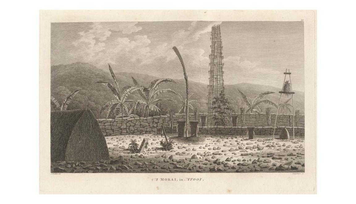 The inner courtyard of a ceremonial compound. The ground is littered with rocks and small pebbles. In the foreground is a straw or thatched triangular hut. In the centre rear of the compound is a large tower constructed of vines or thin poles. There is a smaller tower that resembles a bell tower but in place of a bell is foliage. The background is dominated by a mountain range shrouded in vegetation