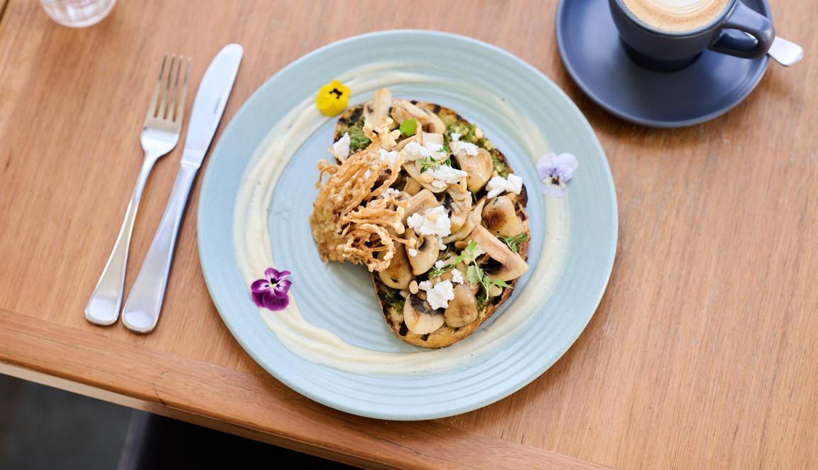 Mushroom toast, coffee and cultery