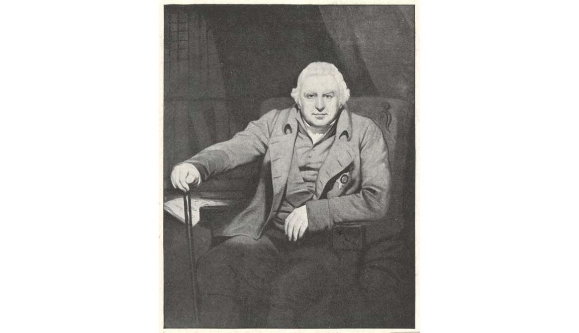wood engraving of man in armchair