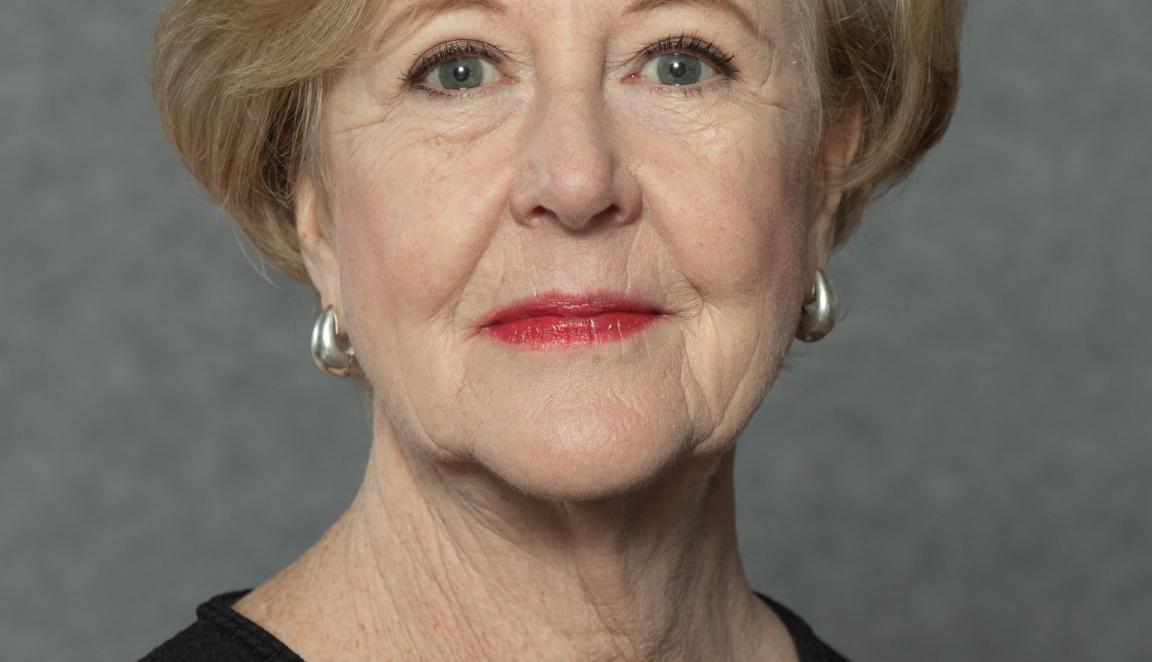 Photo portrait of Gillian Triggs with a small smile