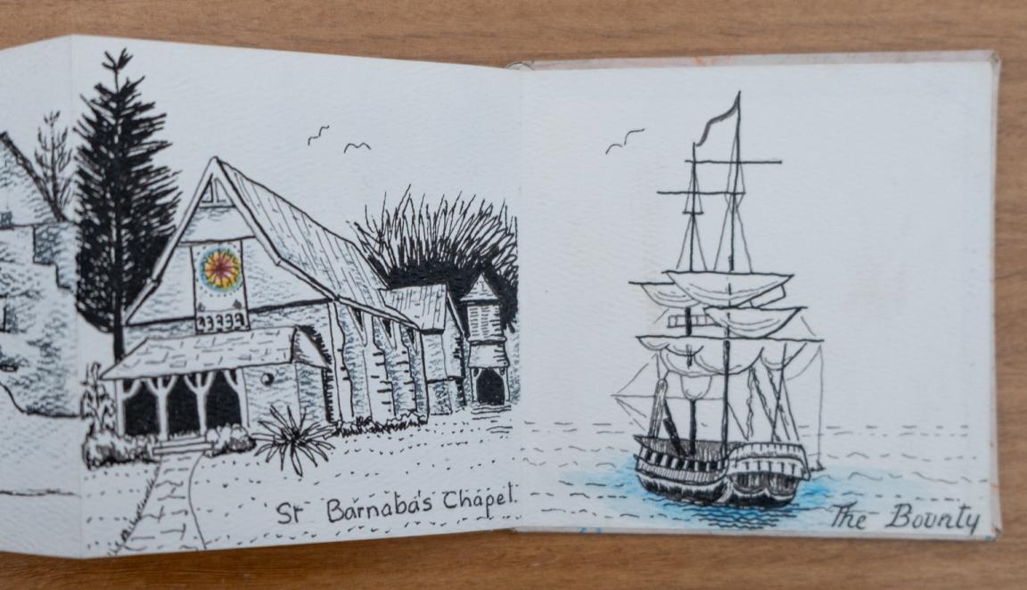Fold-out travel diary open to four pages with black and white illustrations of a chapel labelled 'St Barnabas' Chapel' and a large ship labelled 'The Bounty'