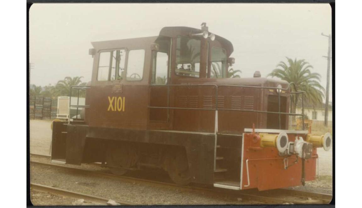 Red shunting tractors on tracks