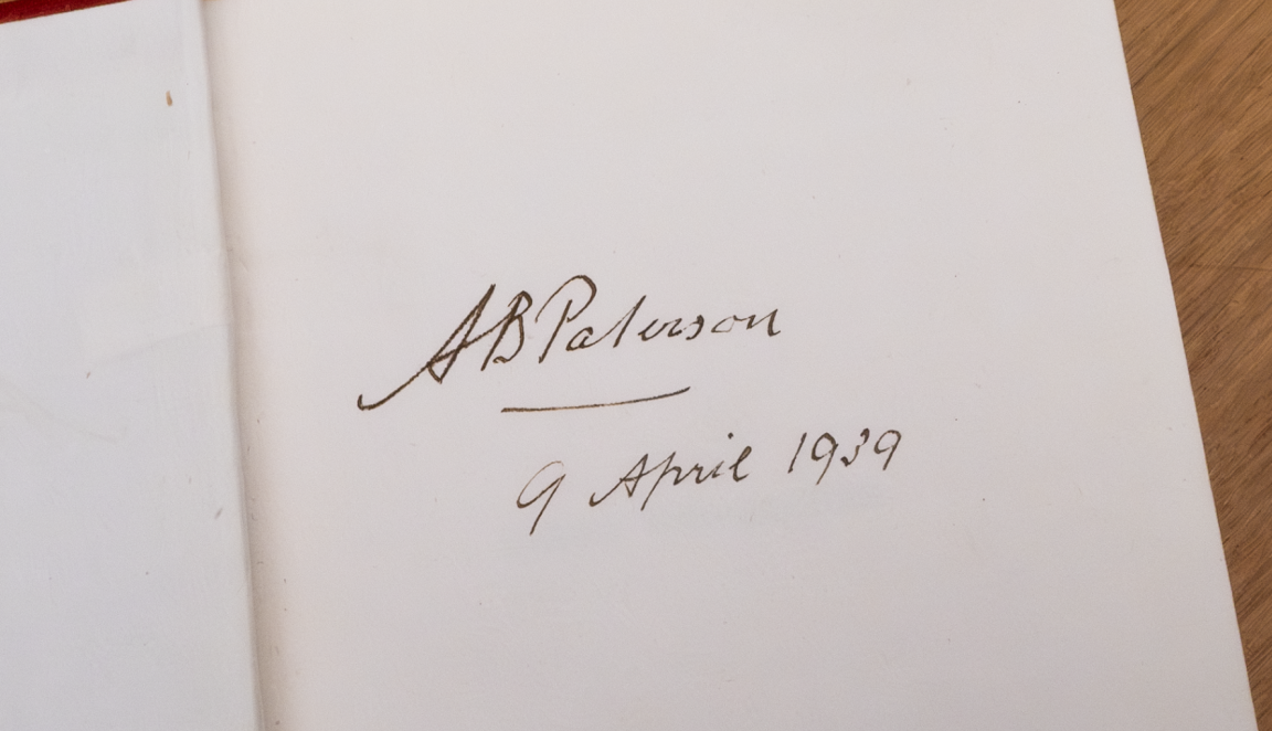 Handwritten signature of Andrew Barton (Banjo) Paterson, with a date, on a blank page in one of his books