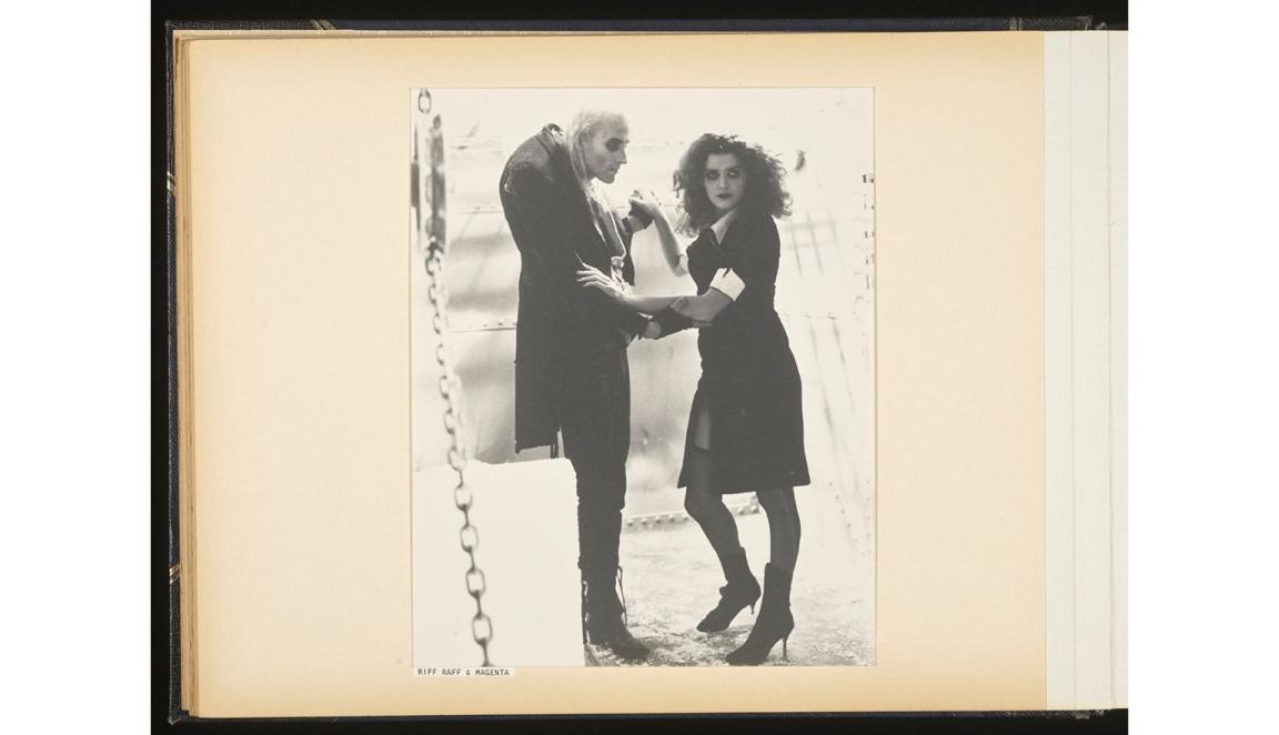Richard O’Brien (Riff Raff) and Patricia Quinn (Magenta) in costume and dancing together on the set of The Rocky Horror Picture Show 
