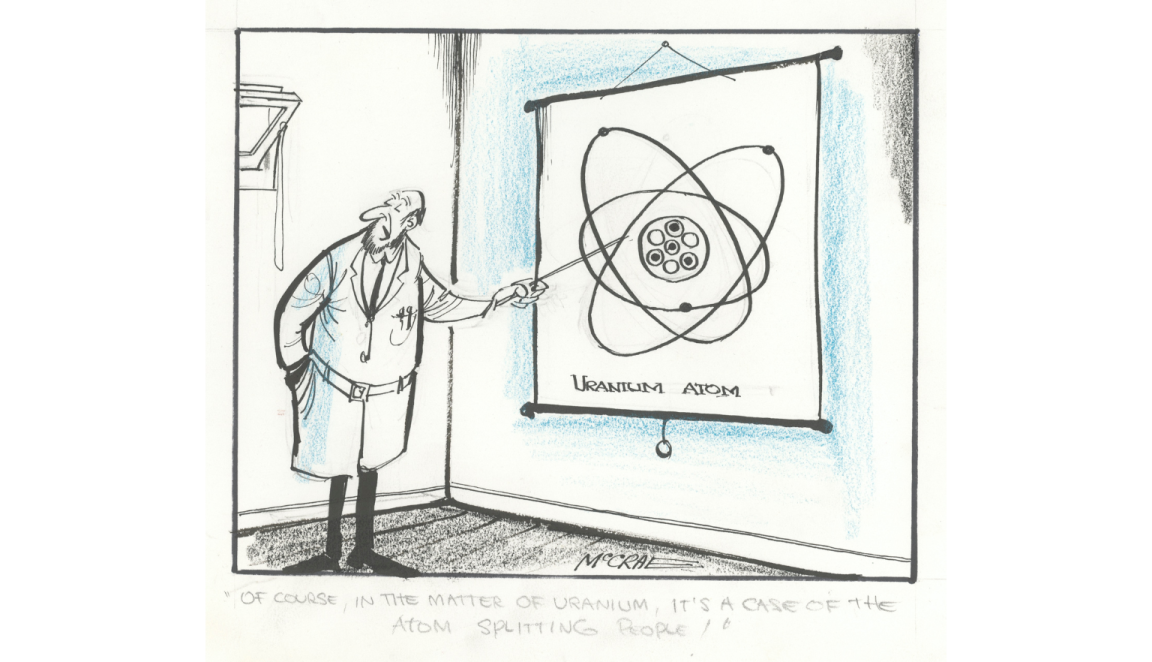 Cartoon of a man gesturing to a diagram of the uranium atom