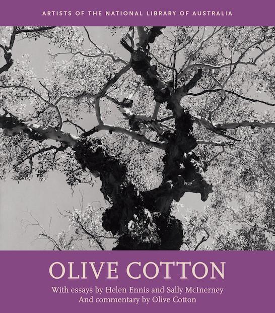 Cover of NLA Publishing book 'Olive Cotton' which features a black and white photograph looking up at a tree and purple along the top and bottom