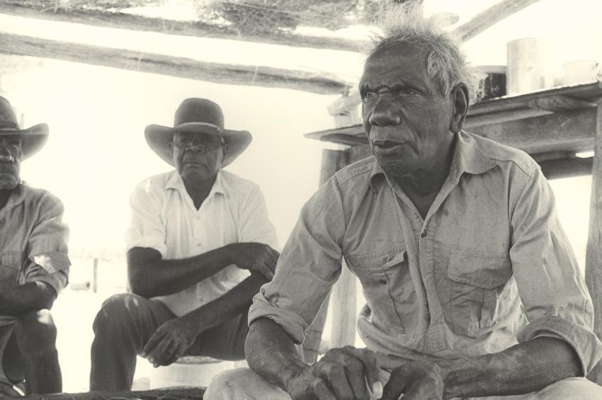 Vincent Lingiari and two other men seated