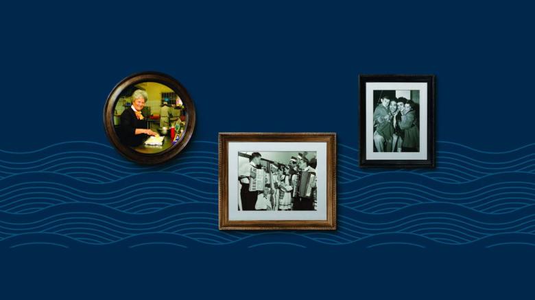 Three framed photographs on a blue wall with a subtle wave pattern.