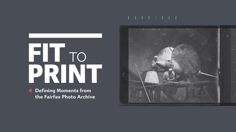 Grey background with white text reading 'Fit to Print: Defining Moments from the Fairfax Archive' and a black and white photo of two men working on a large ship propeller 