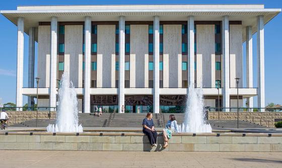 The front of the National Library building showing fountains and steps