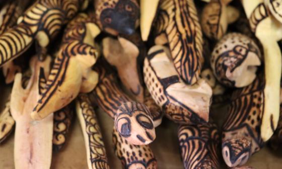 Close up photo of carved wooden objects