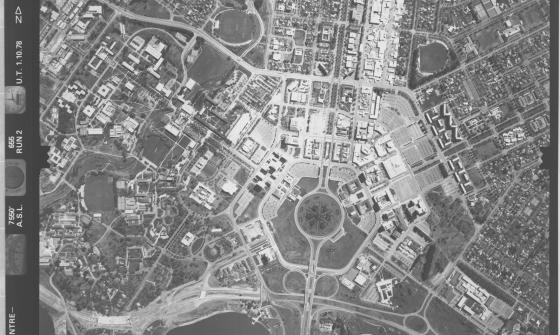 Aerial view of Canberra’s Civic Centre in 1978, showing central roundabouts, surrounding buildings, and Lake Burley Griffin at the bottom edge.
