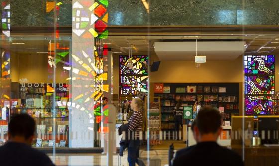 The front of the National Library Bookshop including passing visitors