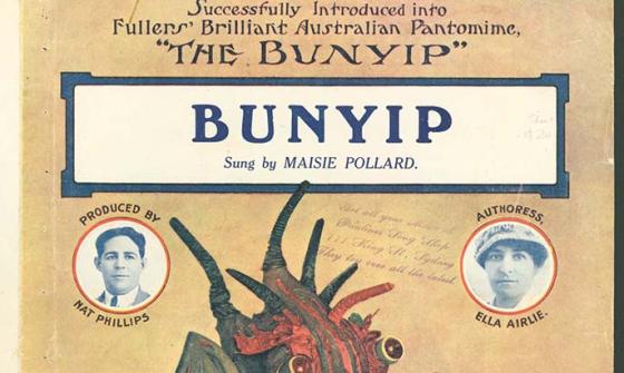 A music book cover of the performance 'Bunyip'. An image of an imagined bunyip takes up the centre of the cover. It looks vaguely like a Chinese dragon crossed with a pig and a cow. It is green and red. Surrounding the Bunyip head are inset portraits of the author, composer and other persons connected with the performance.