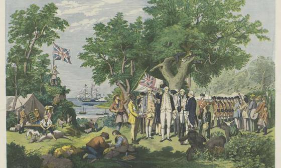 This illustration from 1865 showing Captain James Cook's arrival in Australia. Cook is depicted with his crew raising the British flag as they take possession of the land on behalf of the British Crown in 1770. Indigenous people are shown in the background observing the scene. Ships are anchored in the bay, while a variety of people, including soldiers and sailors, are engaged in various activities.
