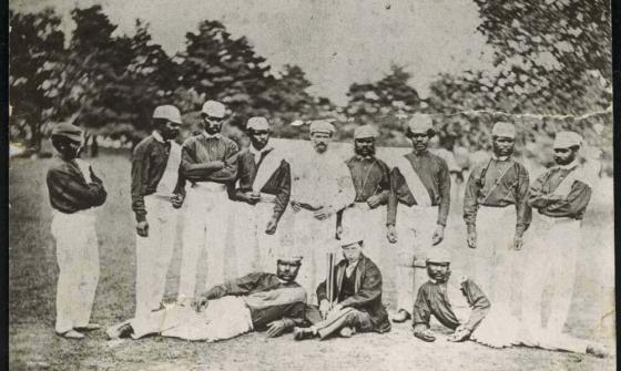 Black and white photo of Aboriginal Australian cricketers in 1868 with C. Lawrence and W. Shepherd as Manager and Captain