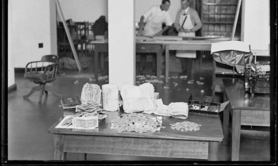 Money in notes and coins on a table
