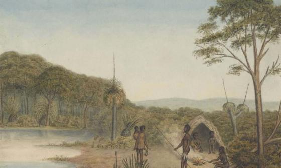 Indigenous people next to a river