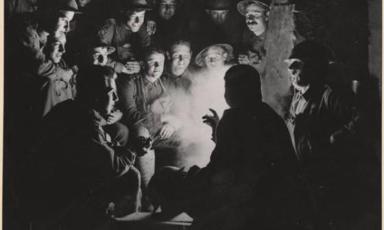 black and white photo of Australian infantrymen in a dugout in 1917