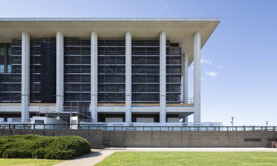 National Library building with scaffolding along the walls on a sunny day