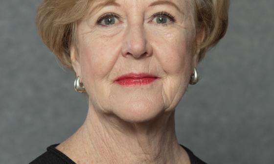 Photo portrait of Gillian Triggs with a small smile