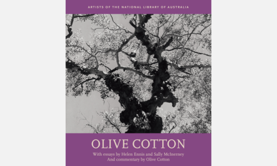 Cover of NLA Publishing book 'Olive Cotton' which features a black and white photograph looking up at a tree and purple along the top and bottom