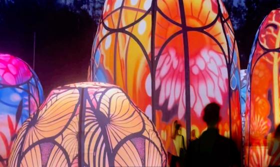 Large, colourful, immersive, inflatable artwork with people wandering through
