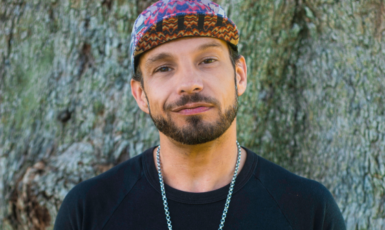 Scott-Patrick Mitchell standing in front of a tree