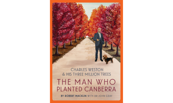 A book cover featuriung a painting of a man in suit standing on tree-lined path with a small dog. COver title: The Man Who Planted Canberra by Robert Macklin and Dr John Gray
