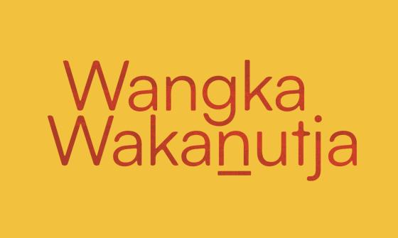 Red text reading 'Wangka Wakanutja' on a yellow background