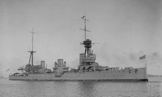 A black and white image of a wartime Naval ship