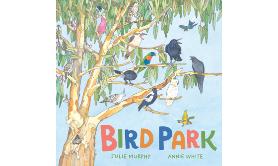 A colorful illustration of many different birds perched on the branches of a large tree with green leaves against a light blue sky. The title 'BIRD PARK' is displayed prominently in multi-colored letters at the bottom, with the names Julie Murphy and Annie White underneath.