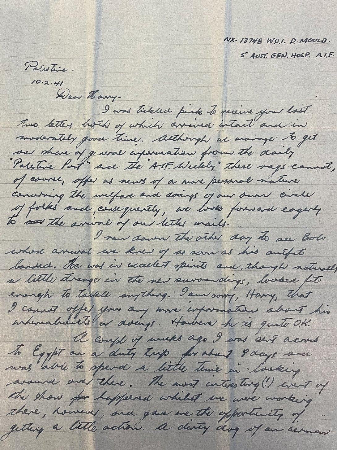First page of a handwritten letter on blue lined paper