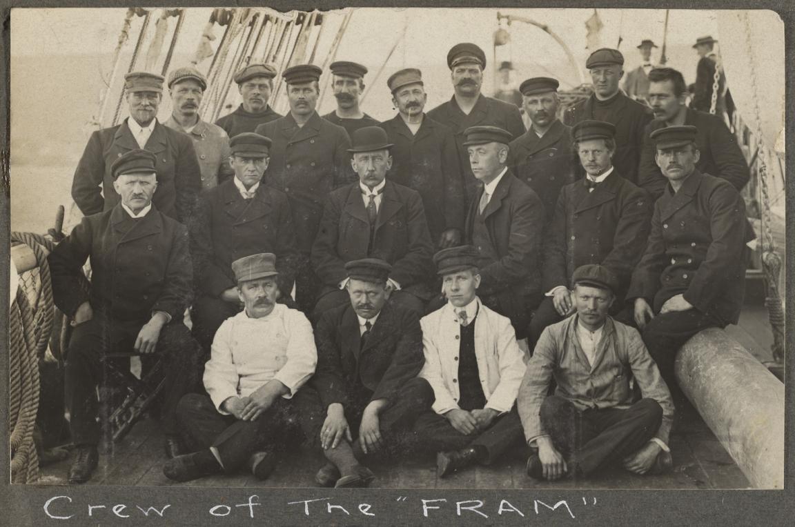 Black and white image of a group of uniformed men who make up the crew of the 'Fram' ship in 1912