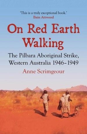 The book cover of On Red Earth Walking features two figures walking across a red desert landscape with mountains in the background.
