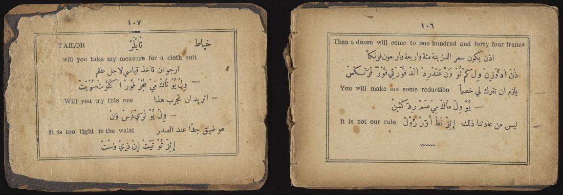 A photograph of two pages from an aged and worn book. The text on the pages is written in English and Arabic, discussing a conversation about tailoring. On the left page, under the heading "Tailor," the dialogue includes phrases like "will you take my measure for a cloth suit," "Will you try this one," and "It is too tight in the waist." The Arabic translations are positioned below each English sentence. The right page continues with financial discussions, mentioning "Then a dozen will come to one hundred a