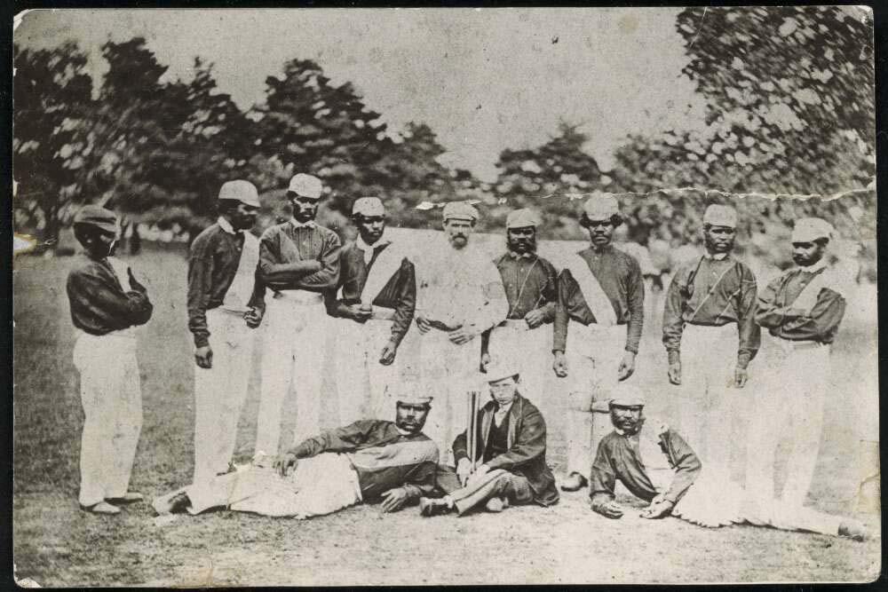 Black and white photo of Aboriginal Australian cricketers in 1868 with C. Lawrence and W. Shepherd as Manager and Captain