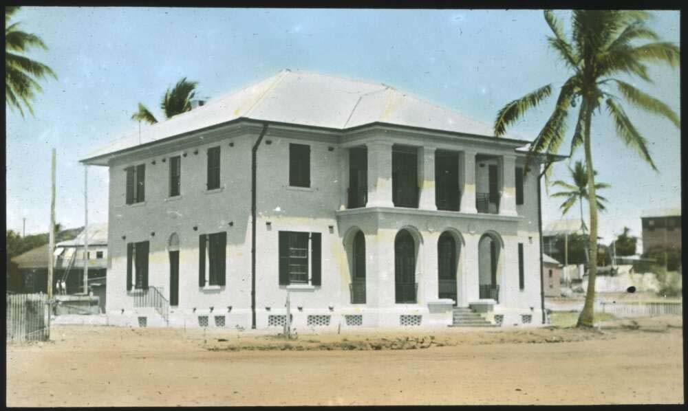 colour photo of a 2-storey white building