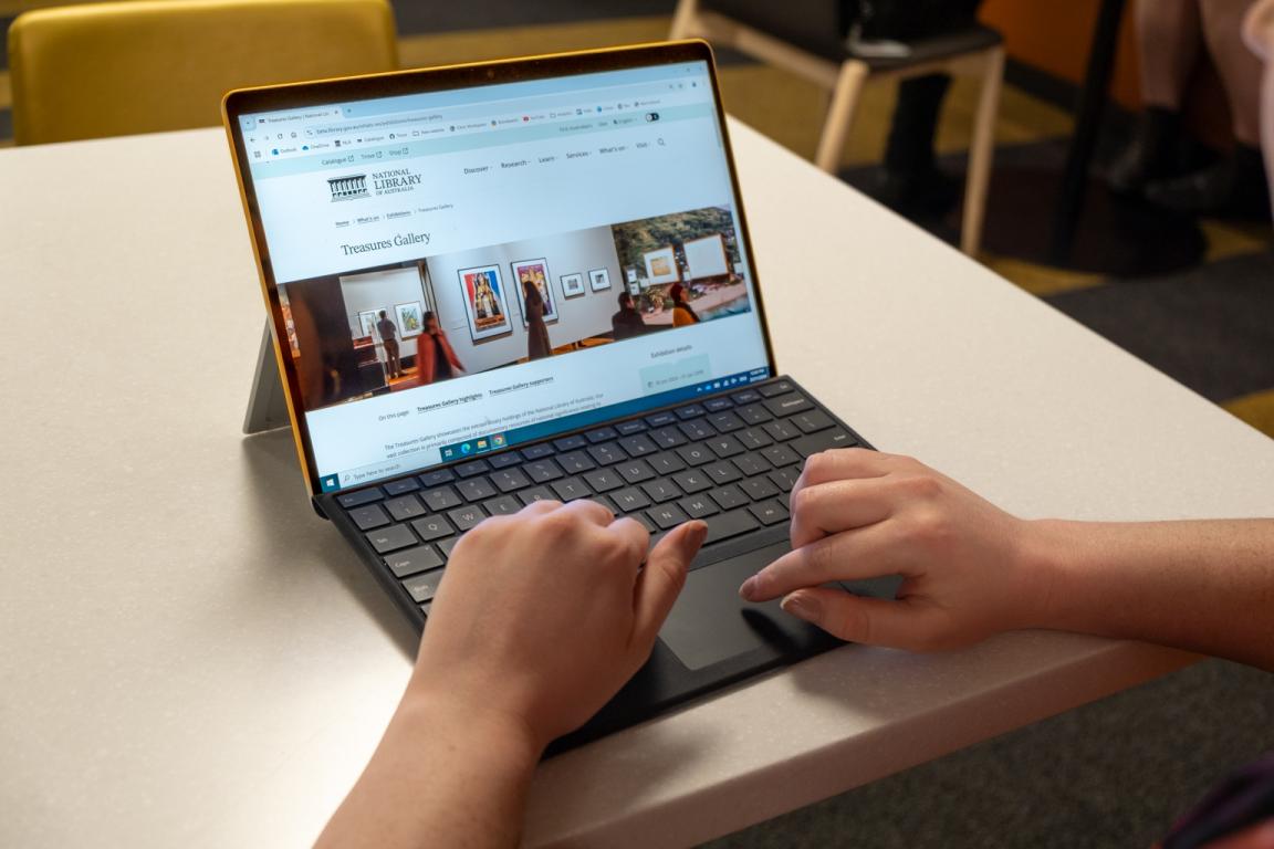 Laptop open to the Treasures Gallery exhibition page of the National Library website