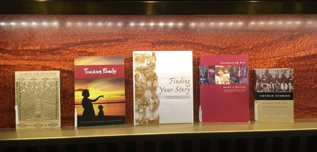 5 First Nations Family History Books on a light shelf on display