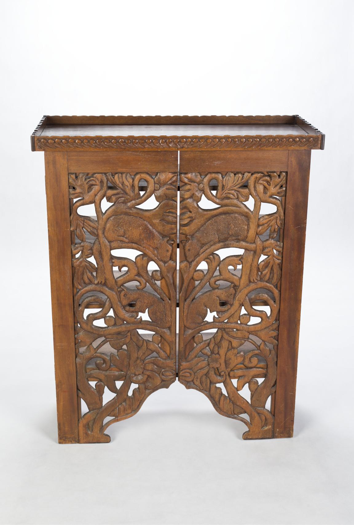 A carved timber bookcase, circa 1900, belonging to Dorothea Mackellar