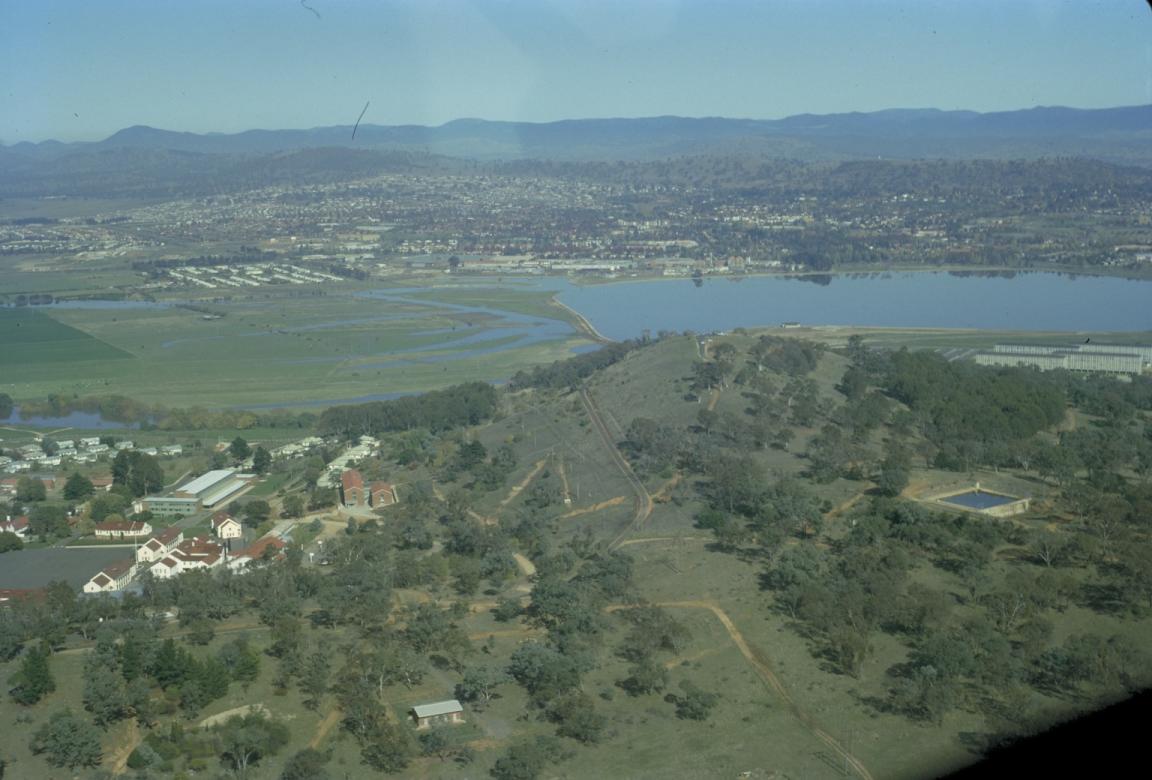 Aerial photo showing a Lake Burley Griffin in progress of being filled