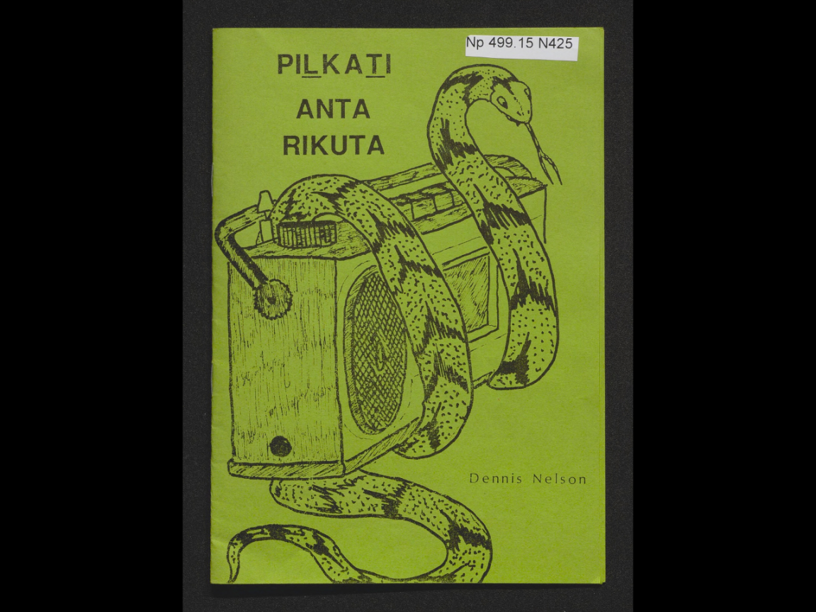 Green book cover, with a snake wrapping around a boom box