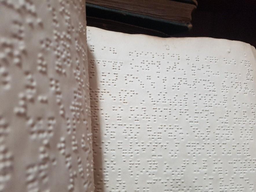 An open book written in braille