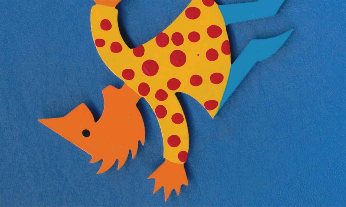 A cartoon of a pointy-nosed orange character wearing a yellow dress with red spots, placed upside down on a bright blue background